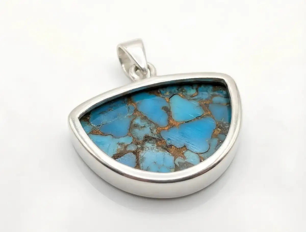 Pendentif Cuivre Bleu Turquoise Naturel en Argent 925 – Expression, Liberté et Harmonie